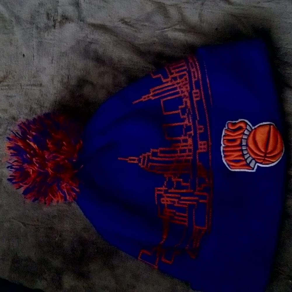 Kicks orange and  blue hat